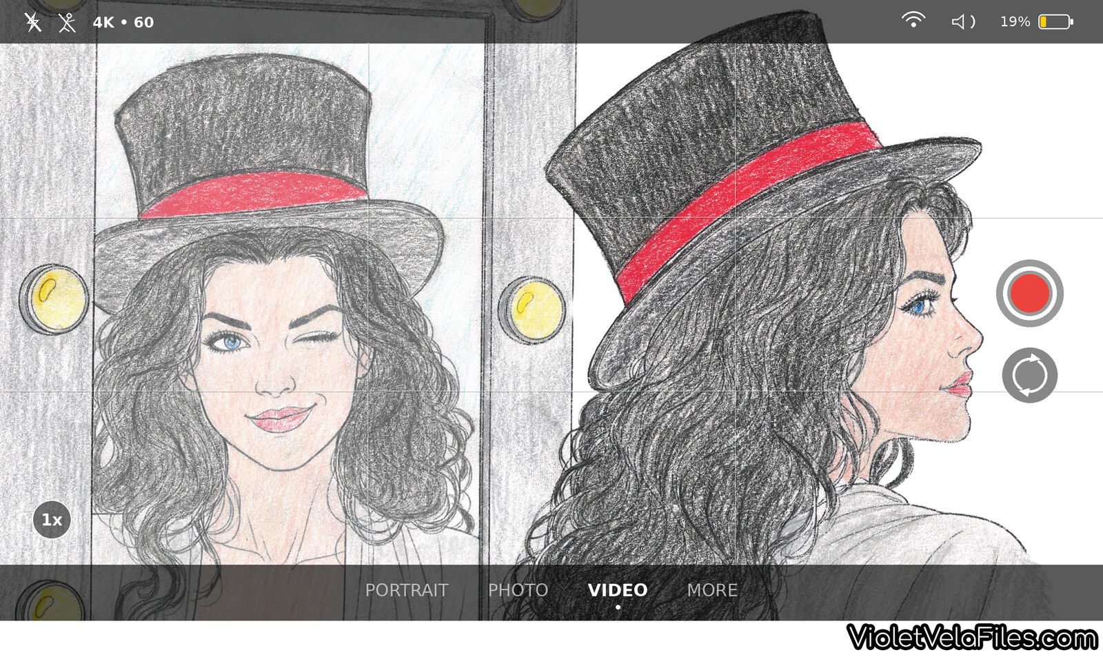 The winking-mirror scene framed in a phone camera viewfinder, recording not yet started, battery at 19 percent